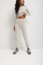 Spodnie dresowe typu jogger z efektem melanżu w kolorze PLATIN GREY - DISPLAY-XL-wyprzedaż