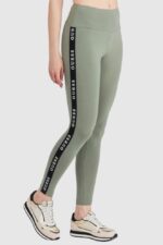GUESS Zielone legginsy damskie z lampasami-wyprzedaż