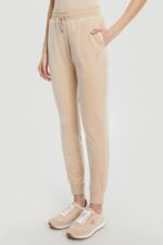 GUESS Beżowe damskie spodnie dresowe Couture