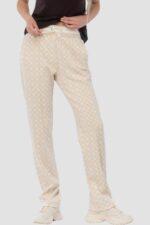 GUESS Beżowe damskie spodnie dresowe w monogram New Aggie