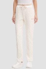 GUESS Kremowe damskie spodnie dresowe w monogram New Aggie