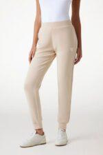 GUESS Spodnie damskie dresowe w kolorze taupe Olympe